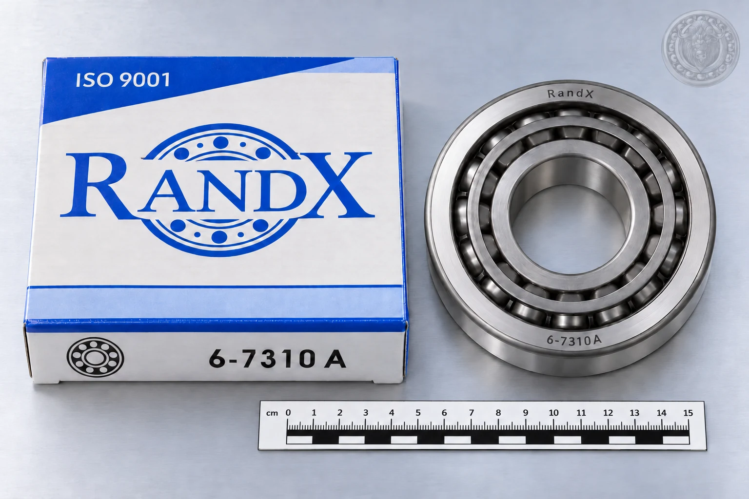 Иллюстрация RandX 6-7310 A по фотографии товара, с коробкой; линейка для ориентировочного масштаба: Подшипник RandX 6-7310 A